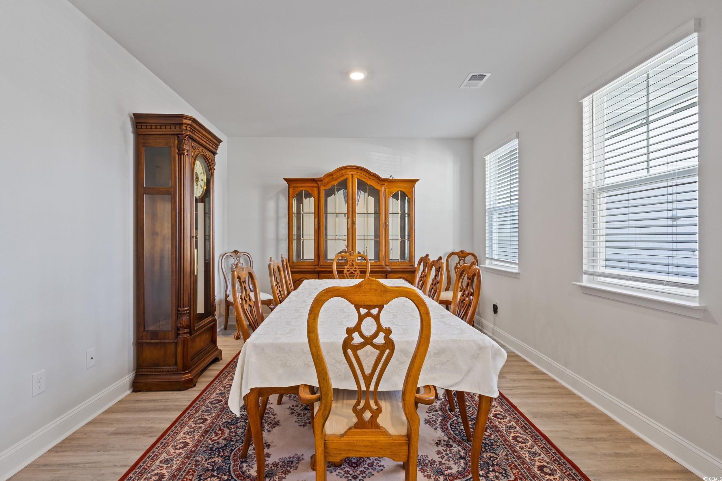 4070 Rutherford Court Little River, SC 29566 - Photo 18 of 40 Dining room featuring light wood-type flooring and recessed lighting