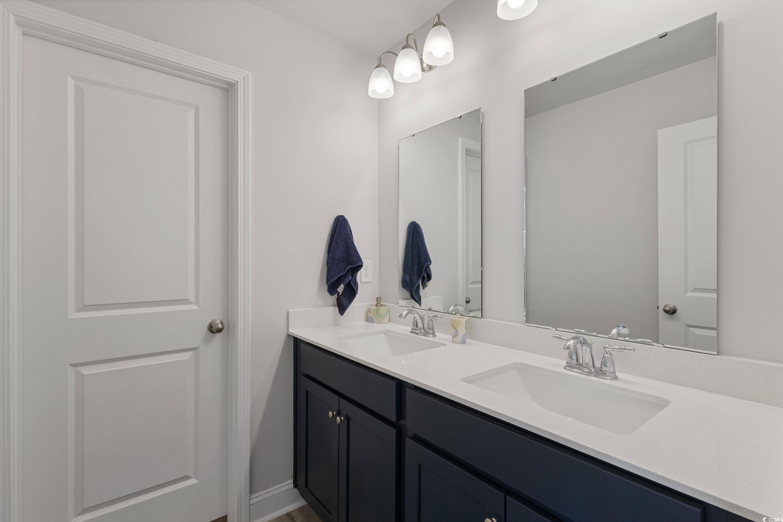 4070 Rutherford Court Little River, SC 29566 - Photo 29 of 40 Bathroom with double vanity