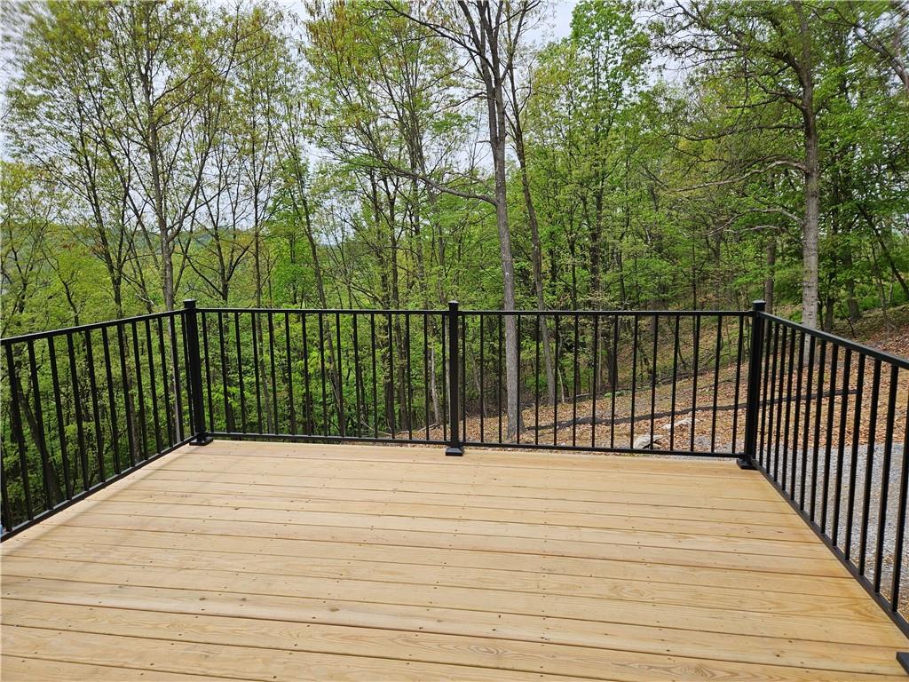 128 Reservoir Road, Unit B Mars, PA 16046 - Photo 4 of 18 a view of balcony and wooden floor
