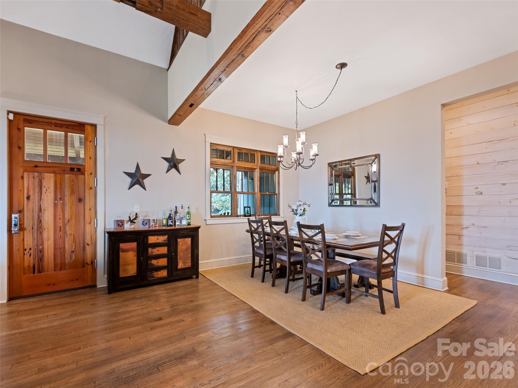 1635 Quest Ridge Sylva, NC 28779 - Photo 11 of 48 a view of a dining room with furniture window and wooden floor
