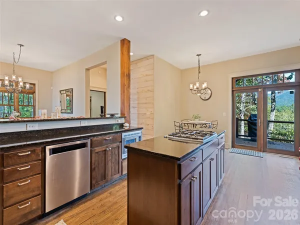 a kitchen with a stove and a sink