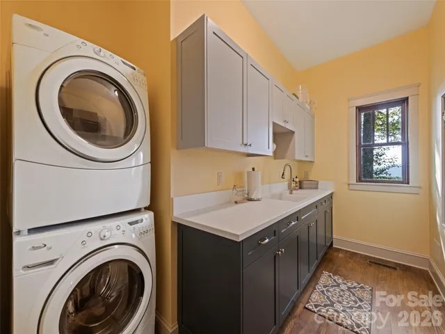 a utility room with dryer and washer