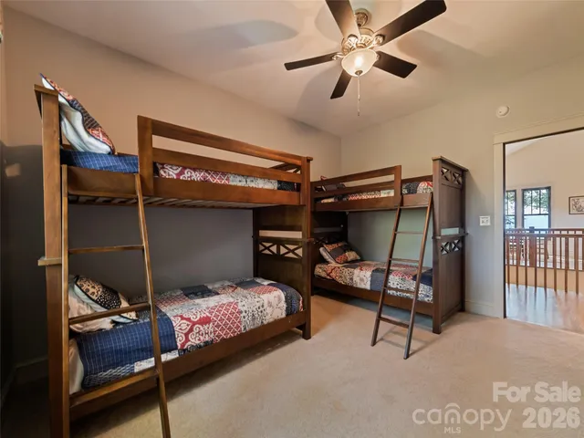 a bedroom with bed and window