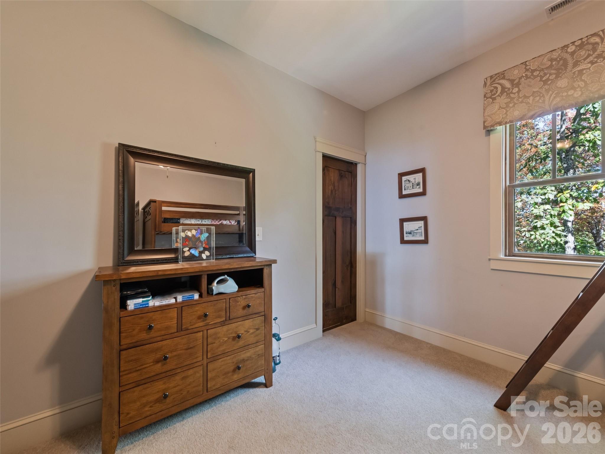 1635 Quest Ridge Sylva, NC 28779 - Photo 29 of 48 a room with window and cabinet