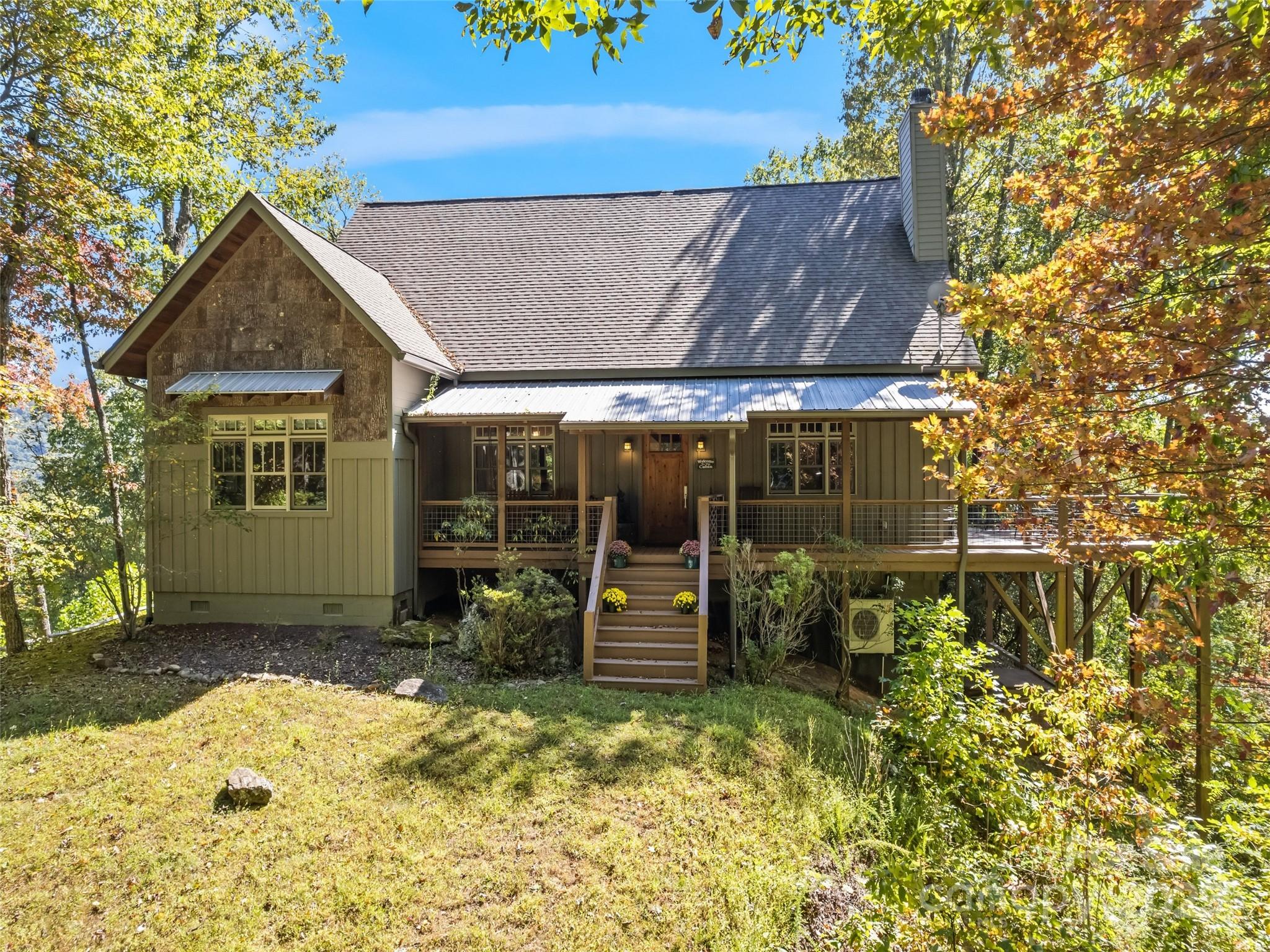 1635 Quest Ridge Sylva, NC 28779 - Photo 35 of 48 front view of a house with a yard
