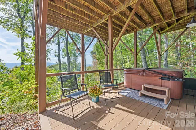 a view of a patio with wooden floor