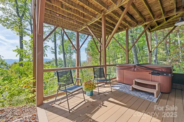 a view of a patio with wooden floor
