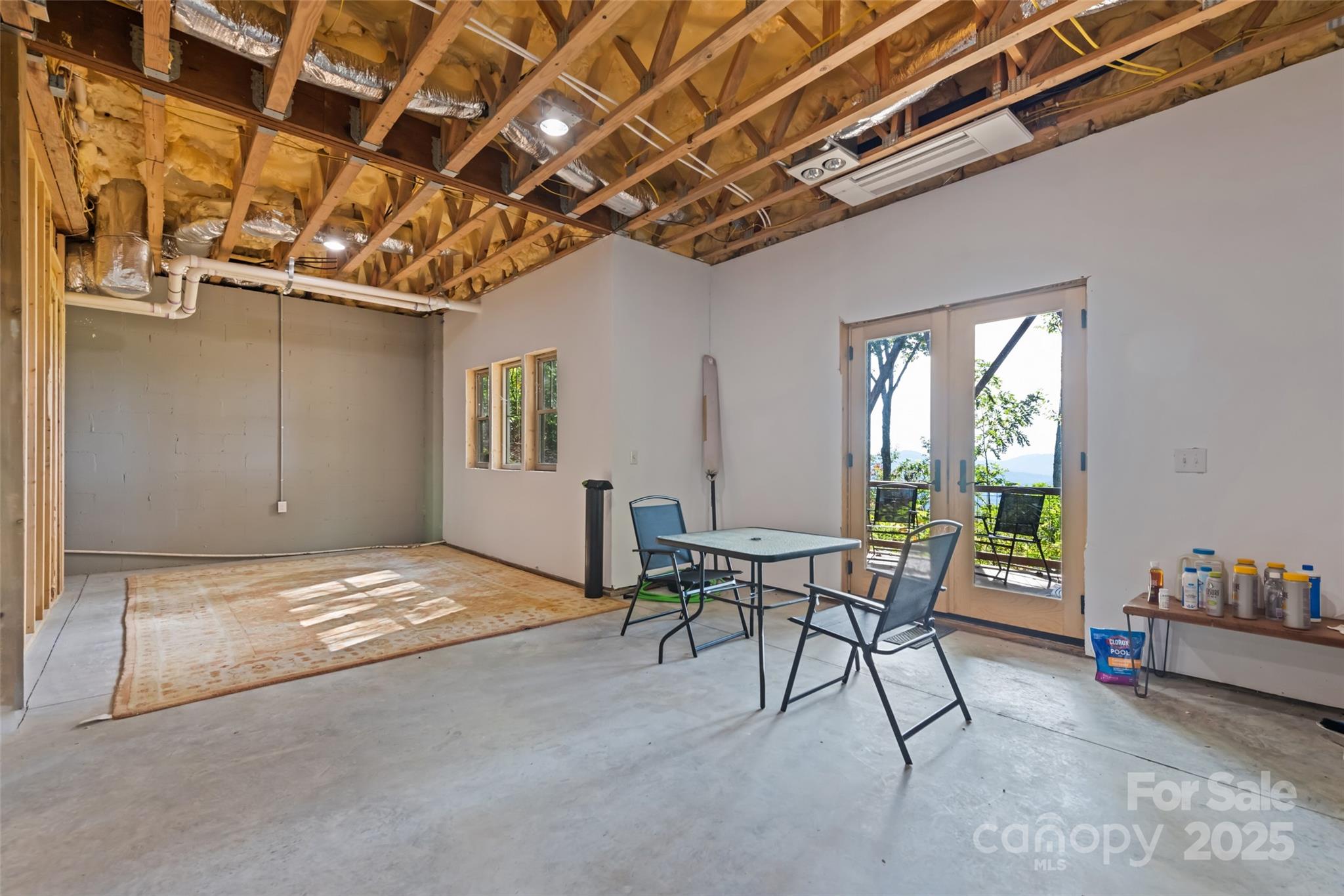 1635 Quest Ridge Sylva, NC 28779 - Photo 37 of 48 a view of a livingroom with furniture and a window