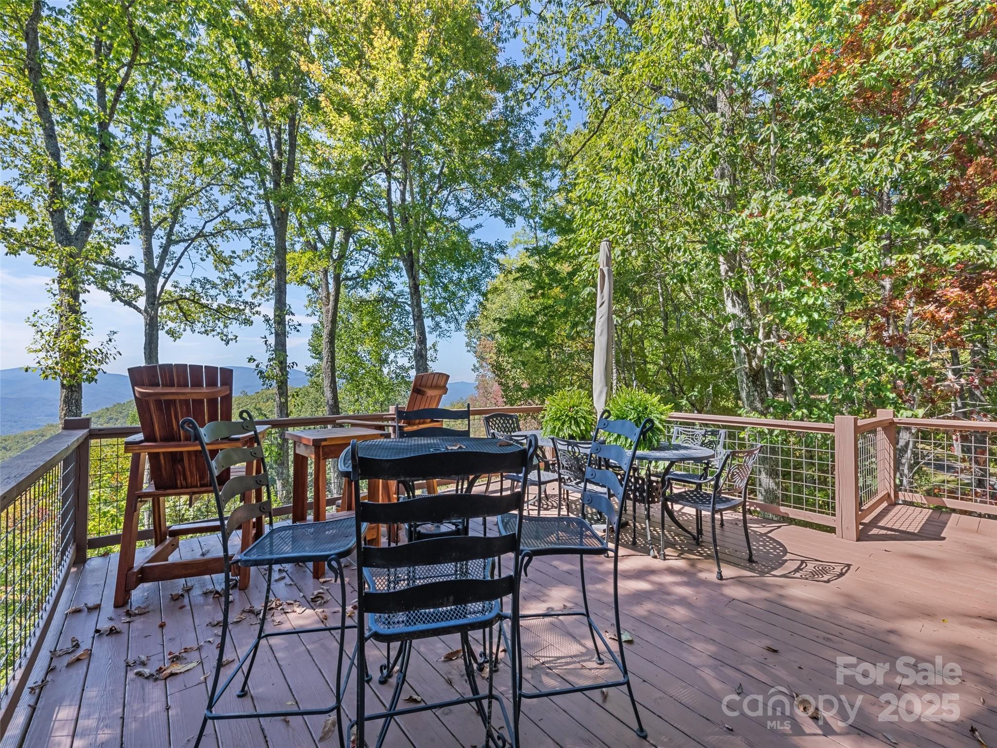 1635 Quest Ridge Sylva, NC 28779 - Photo 41 of 48 a view of a chairs and table in patio