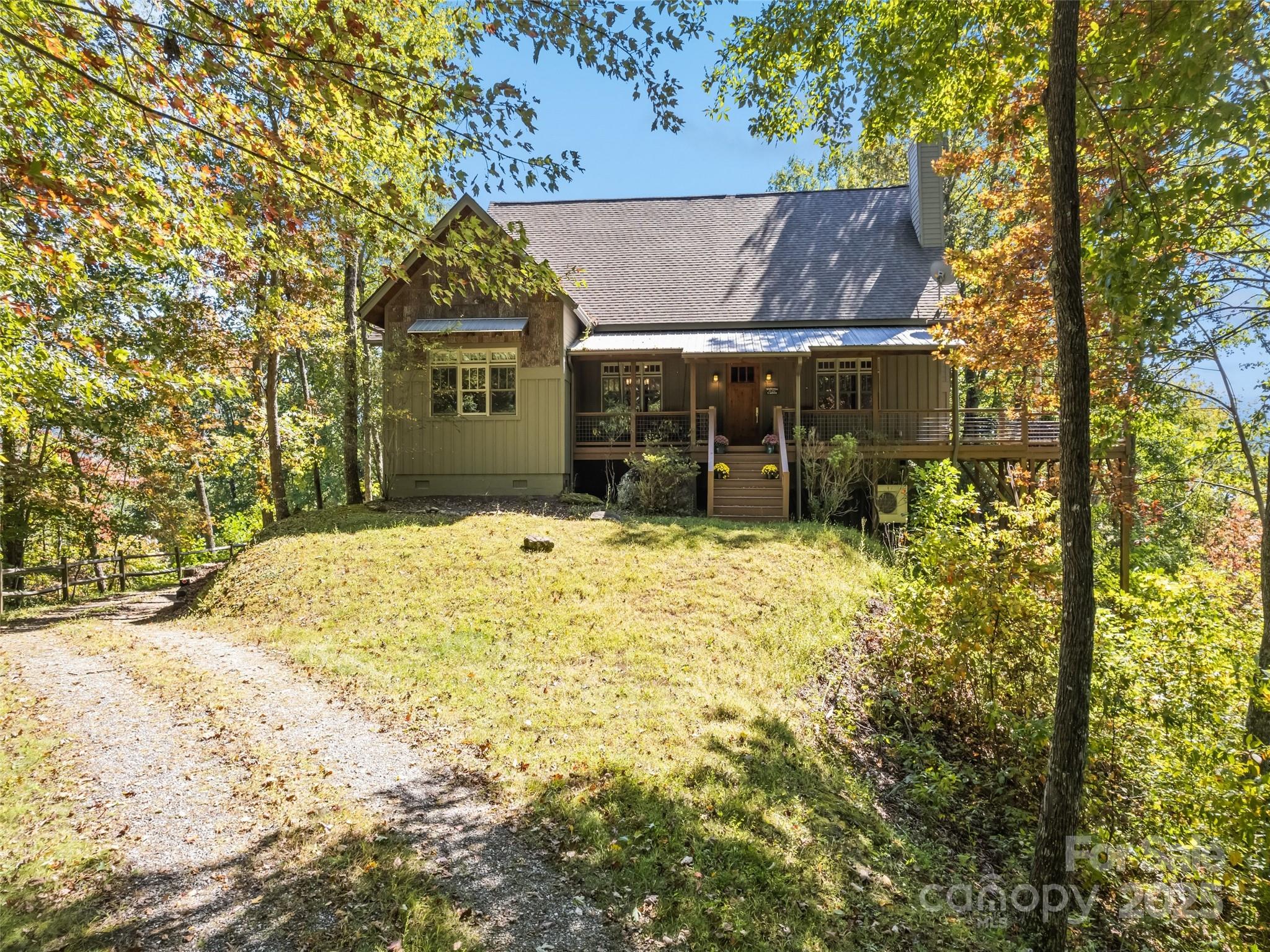 1635 Quest Ridge Sylva, NC 28779 - Photo 43 of 48 a view of a house with a yard