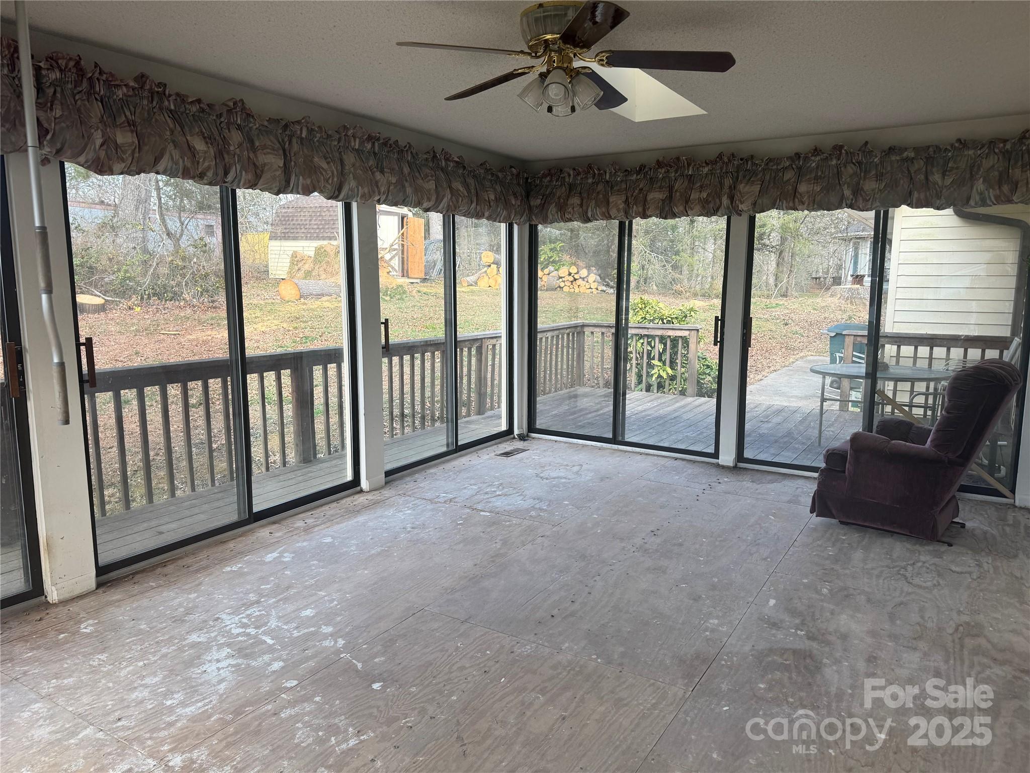 29 Westfield Road Fletcher, NC 28732 - Photo 4 of 10 a view of an empty room with furniture and windows