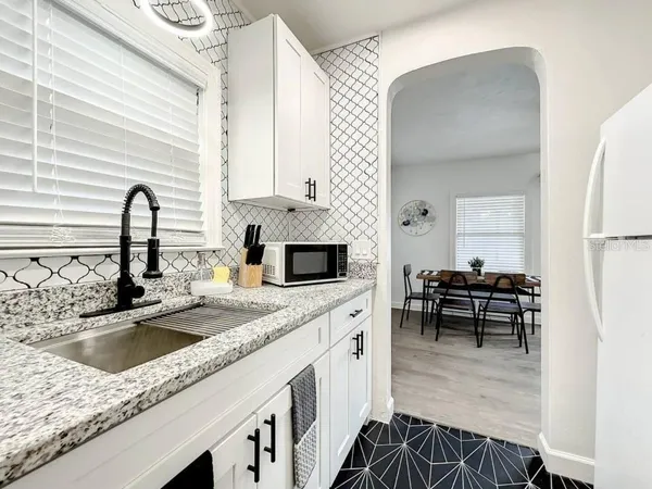 $890,000 | 1829 Hollenbeck Drive, Orlando, FL 32806