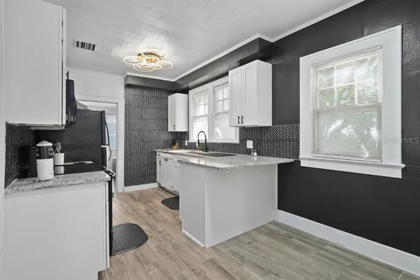 $890,000 | 1829 Hollenbeck Drive, Orlando, FL 32806