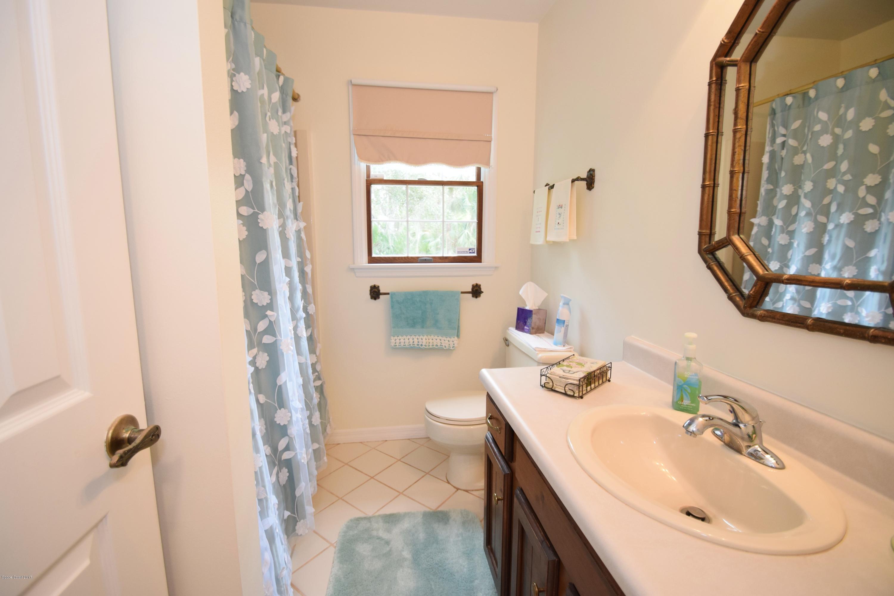 4485 Lake Washington Road Melbourne, FL 32934 - Photo 13 of 20 Downstairs Full Bath