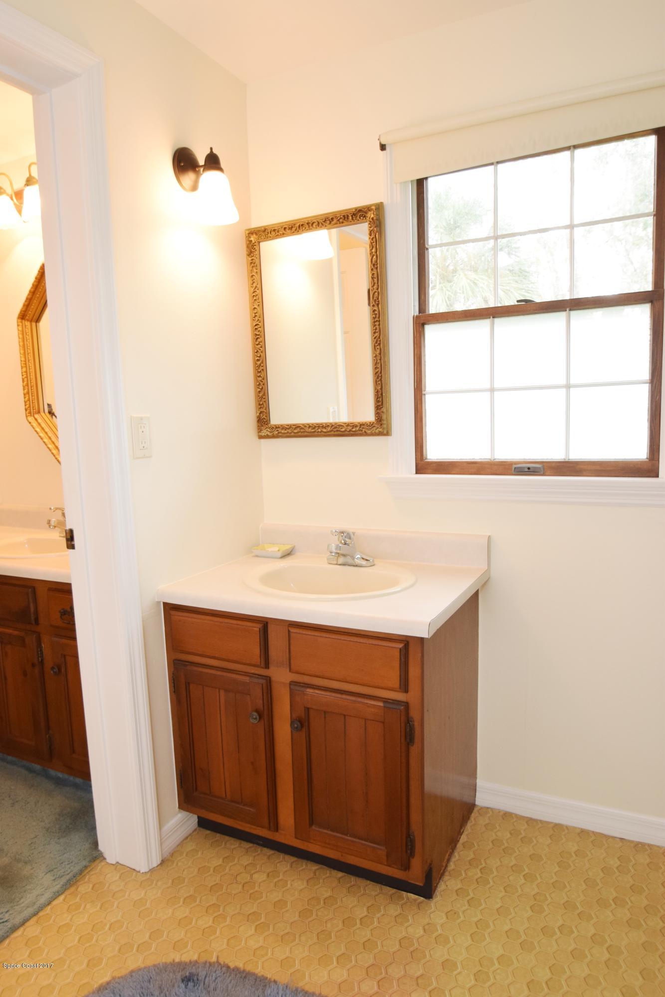 4485 Lake Washington Road Melbourne, FL 32934 - Photo 18 of 20 Upstairs Bath
