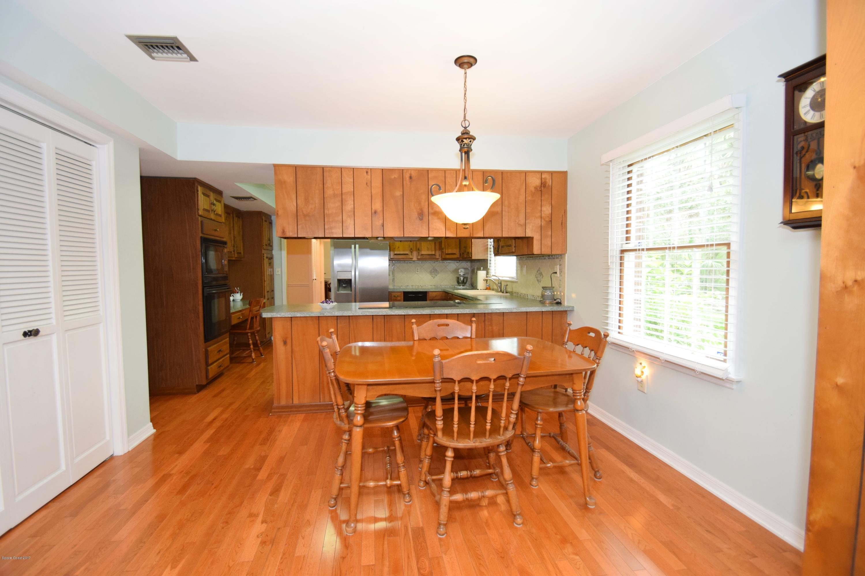 4485 Lake Washington Road Melbourne, FL 32934 - Photo 8 of 20 Breakfast Nook and Kitchen