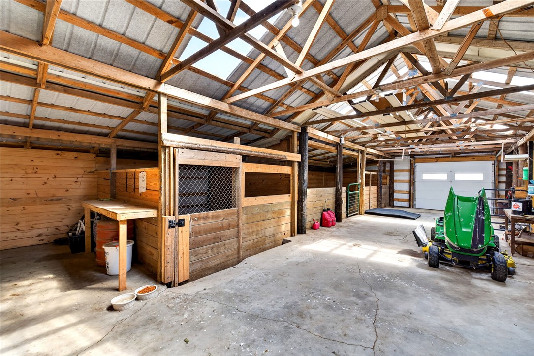 7988 McCool Road Greenville, OH 45331 - Photo 33 of 50 This spacious barn offers ample room and rustic charm for various agricultural pursuits.