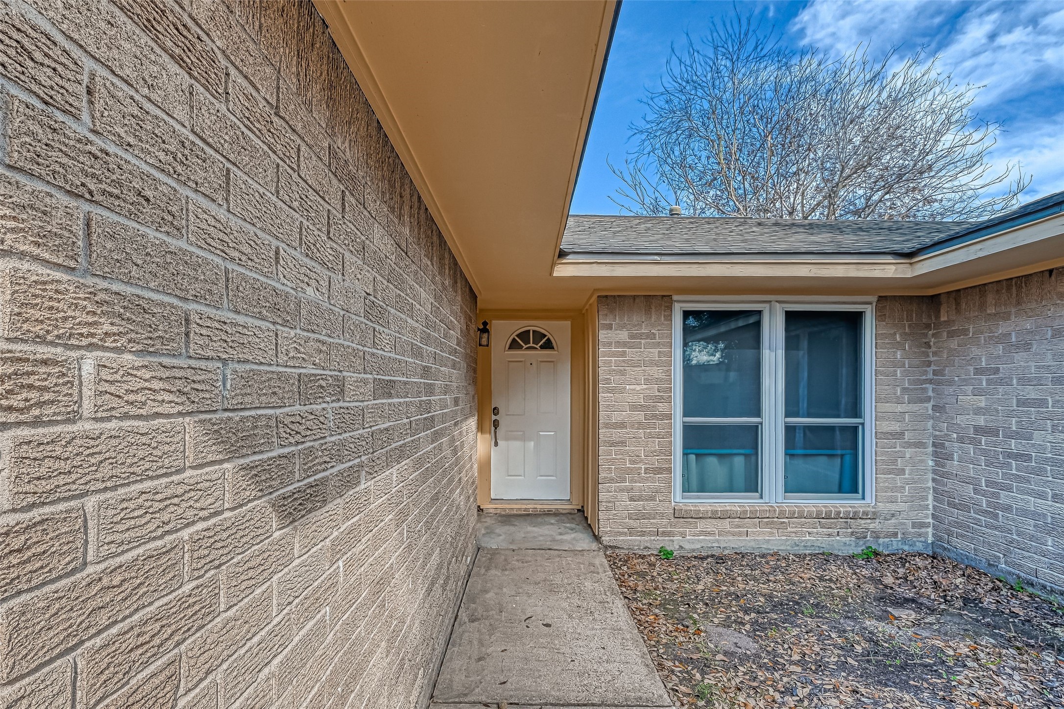 7335 Osage Street Houston, TX 77036 - Photo 2 of 12 a view of entrance gate of a house