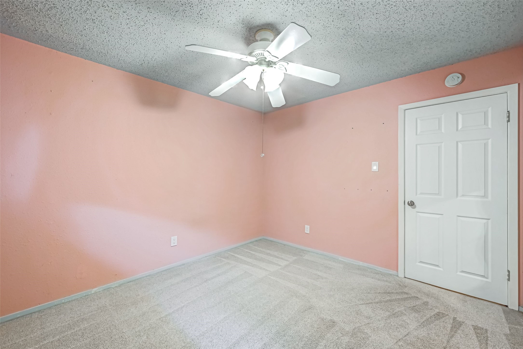 7335 Osage Street Houston, TX 77036 - Photo 9 of 12 en empty room with fan and fan