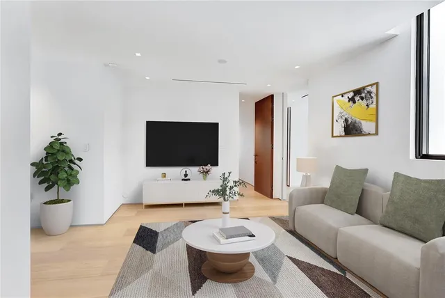a view of a living room and dining room
