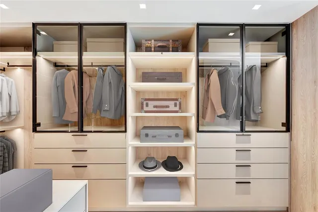 a view of a dining room with furniture and a potted plant