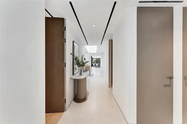 a bathroom with a sink and mirror