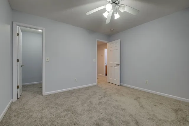 an empty room with a bathroom