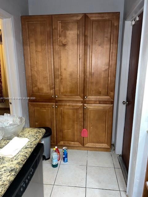 Kendall Green Pompano Beach, FL 33060 - Photo 12 of 24 a bathroom with a granite countertop sink and a washing machine