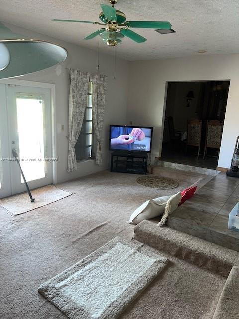 Kendall Green Pompano Beach, FL 33060 - Photo 9 of 24 a living room with furniture and a fireplace