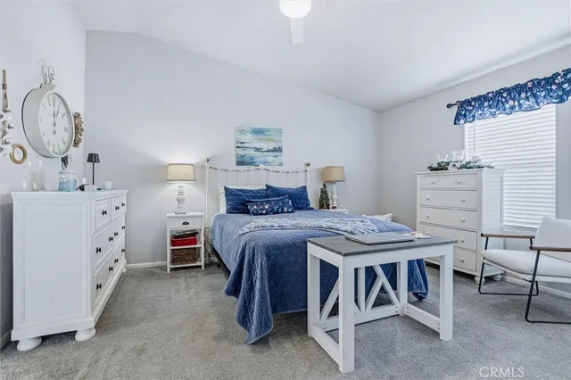 a bedroom with a bed and furniture