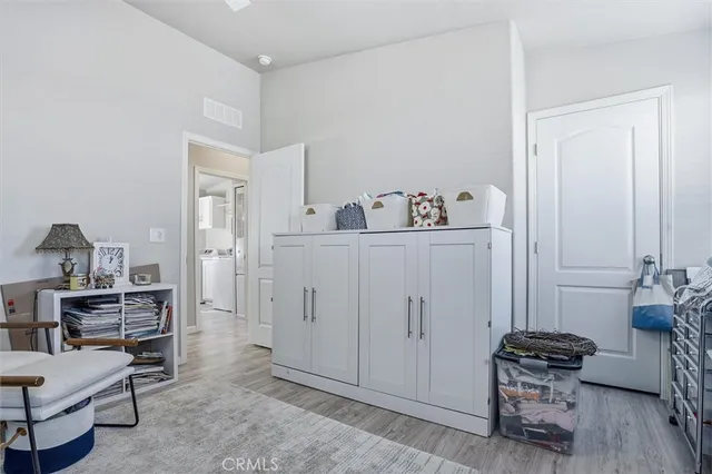 a utility room with closet dryer and washer