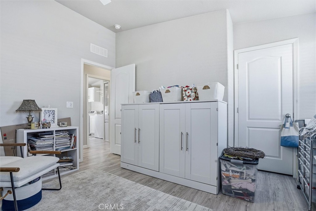500 Atascadero Road Morro Bay, CA 93442 - Photo 25 of 36 a room with furniture and wooden floor