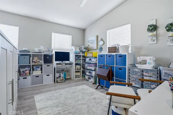 a room with furniture and wooden floor