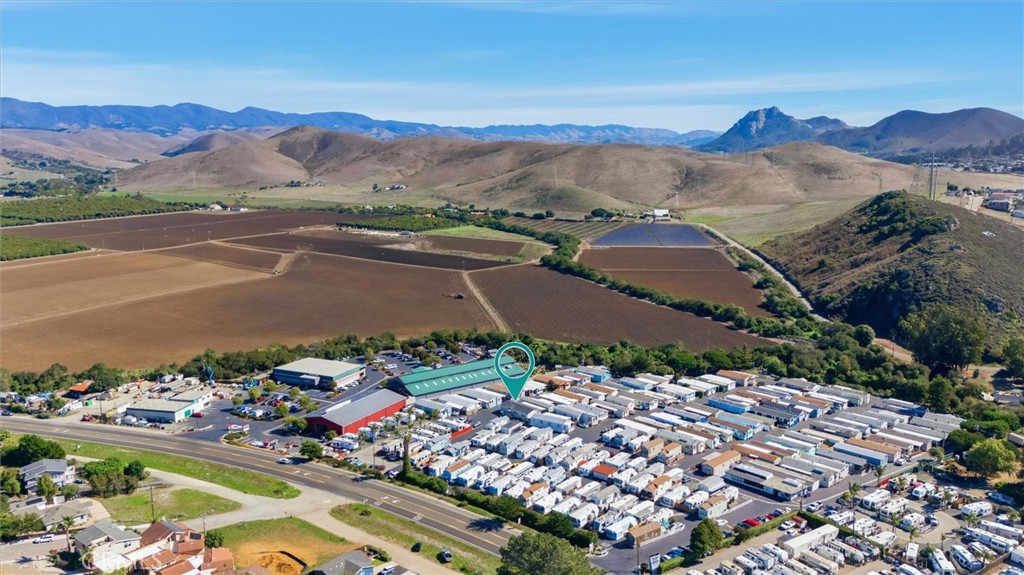 500 Atascadero Road Morro Bay, CA 93442 - Photo 33 of 37 an aerial view of a city with lots of residential buildings and mountain view in back