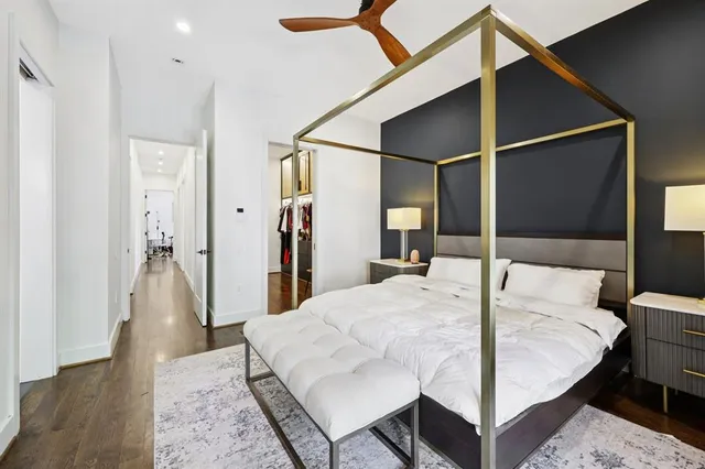 a view of a livingroom with furniture and a garage