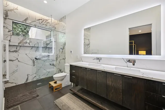 a view of a house with backyard porch and sitting area