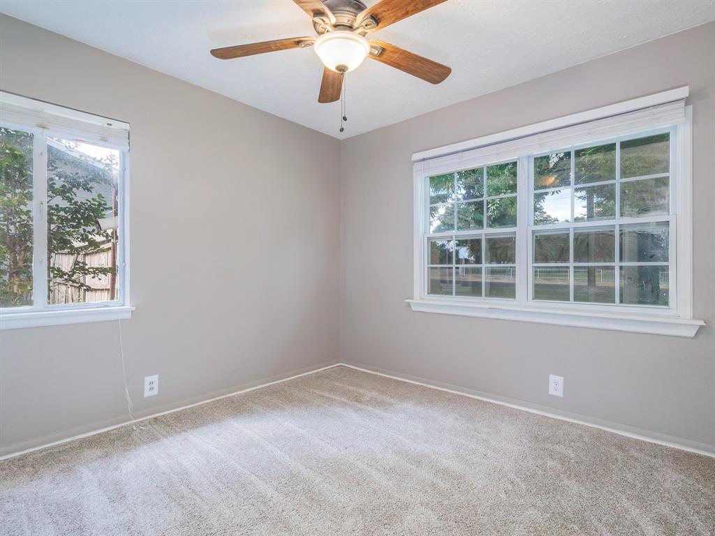 4002 Austin Avenue Brownwood, TX 76801 - Photo 20 of 34 a view of an empty room with a window