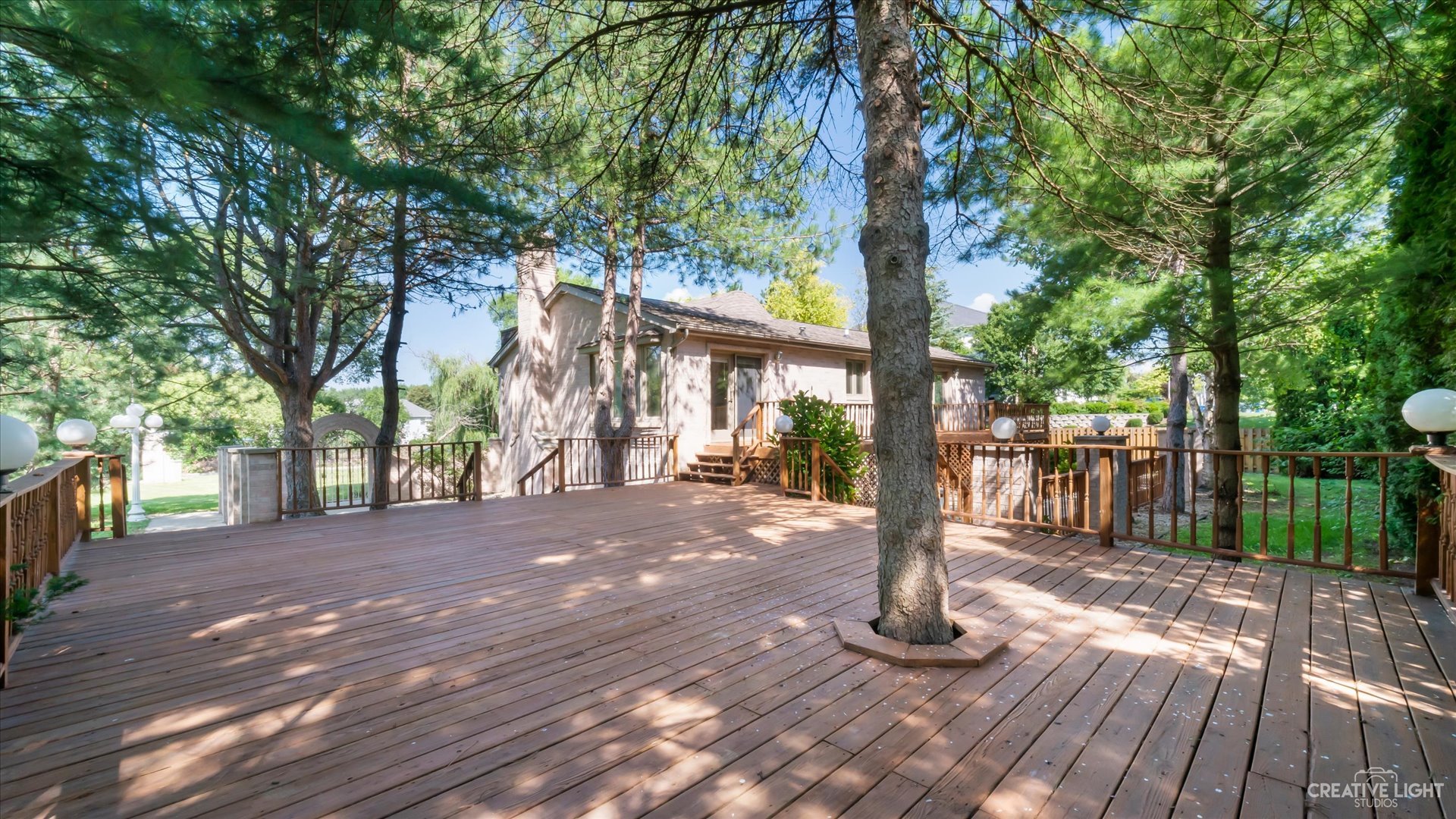 30W400 Army Trail Road Wayne, IL 60184 - Photo 3 of 30 a view of a backyard with trees