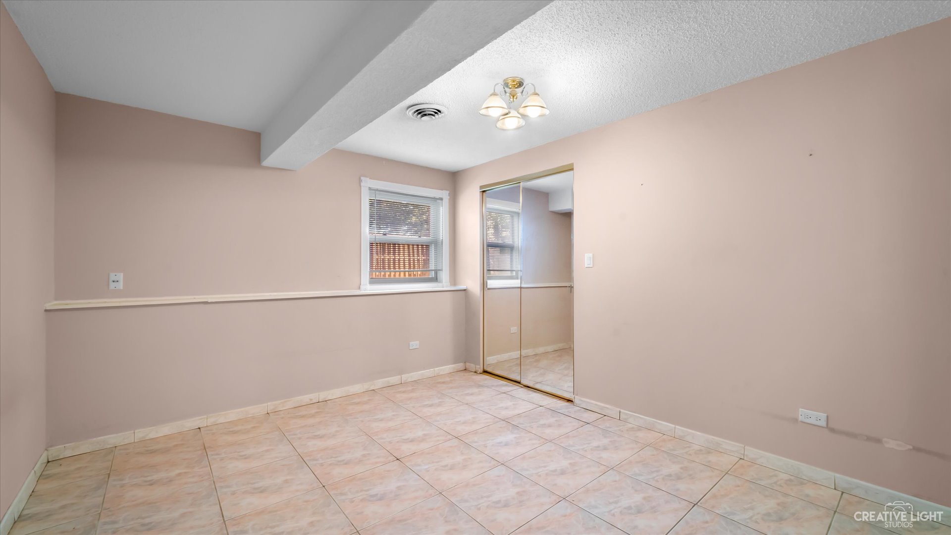 30W400 Army Trail Road Wayne, IL 60184 - Photo 24 of 30 an empty room with chandelier fan