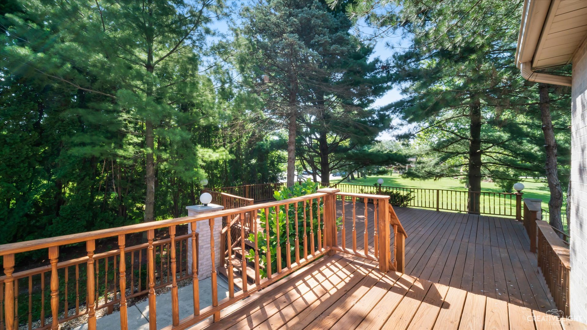 30W400 Army Trail Road Wayne, IL 60184 - Photo 5 of 30 a view of deck and a yard with wooden fence