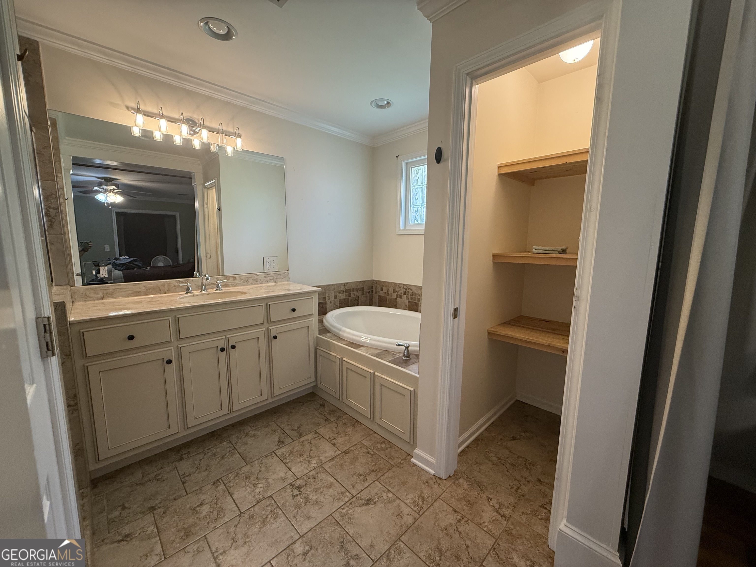 1191 Aderhold Rogers Road Commerce, GA 30530 - Photo 24 of 33 a view of a bathroom with mirror and sink
