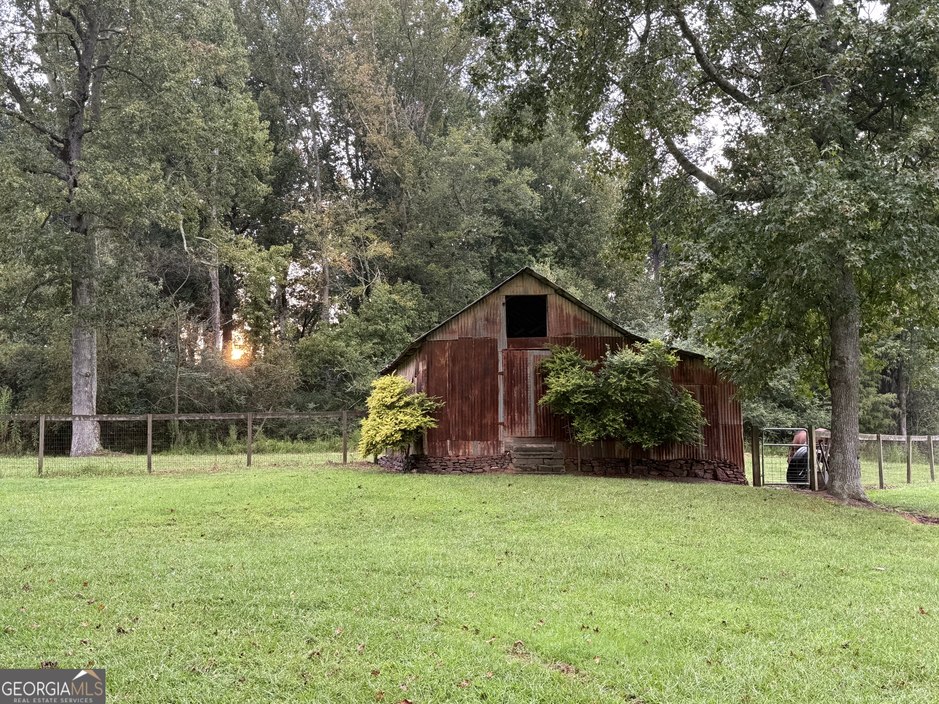 1191 Aderhold Rogers Road Commerce, GA 30530 - Photo 29 of 33 a view of a house with a yard and tree s