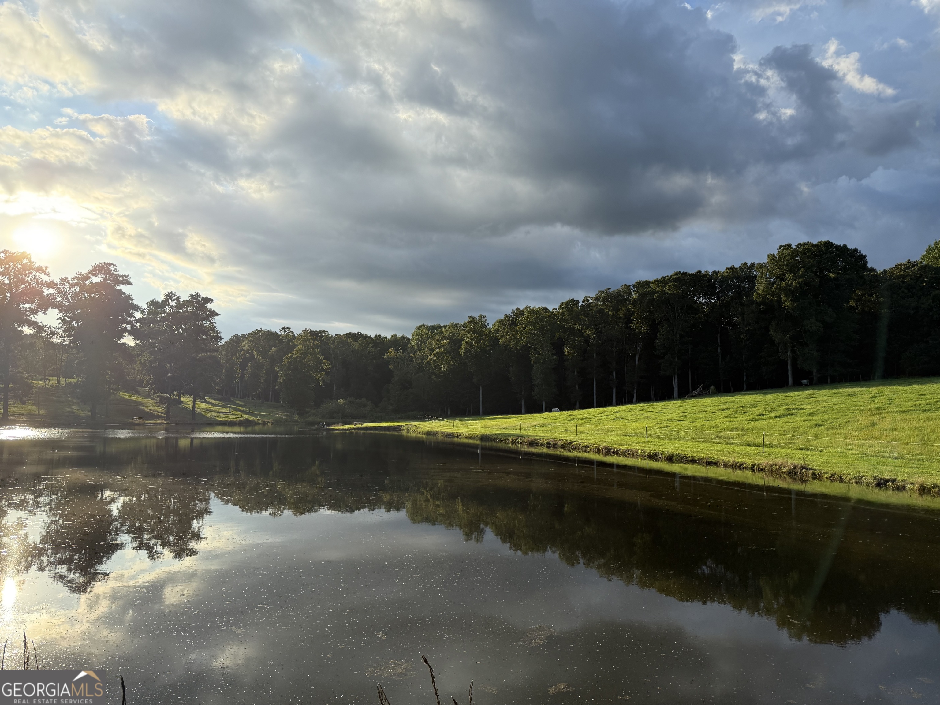 1191 Aderhold Rogers Road Commerce, GA 30530 - Photo 31 of 33 a view of a lake with houses in the background