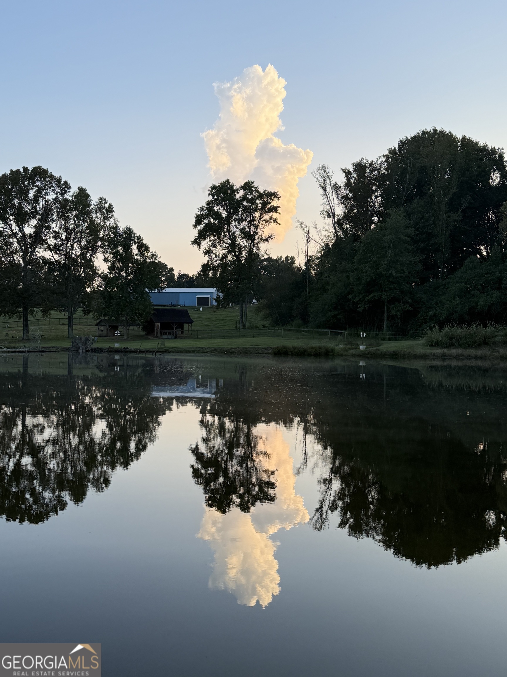 1191 Aderhold Rogers Road Commerce, GA 30530 - Photo 33 of 33 a body of water with a tree in the background