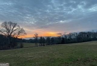1191 Aderhold Rogers Road Commerce, GA 30530 - Photo 5 of 33 a view of an outdoor space and a yard