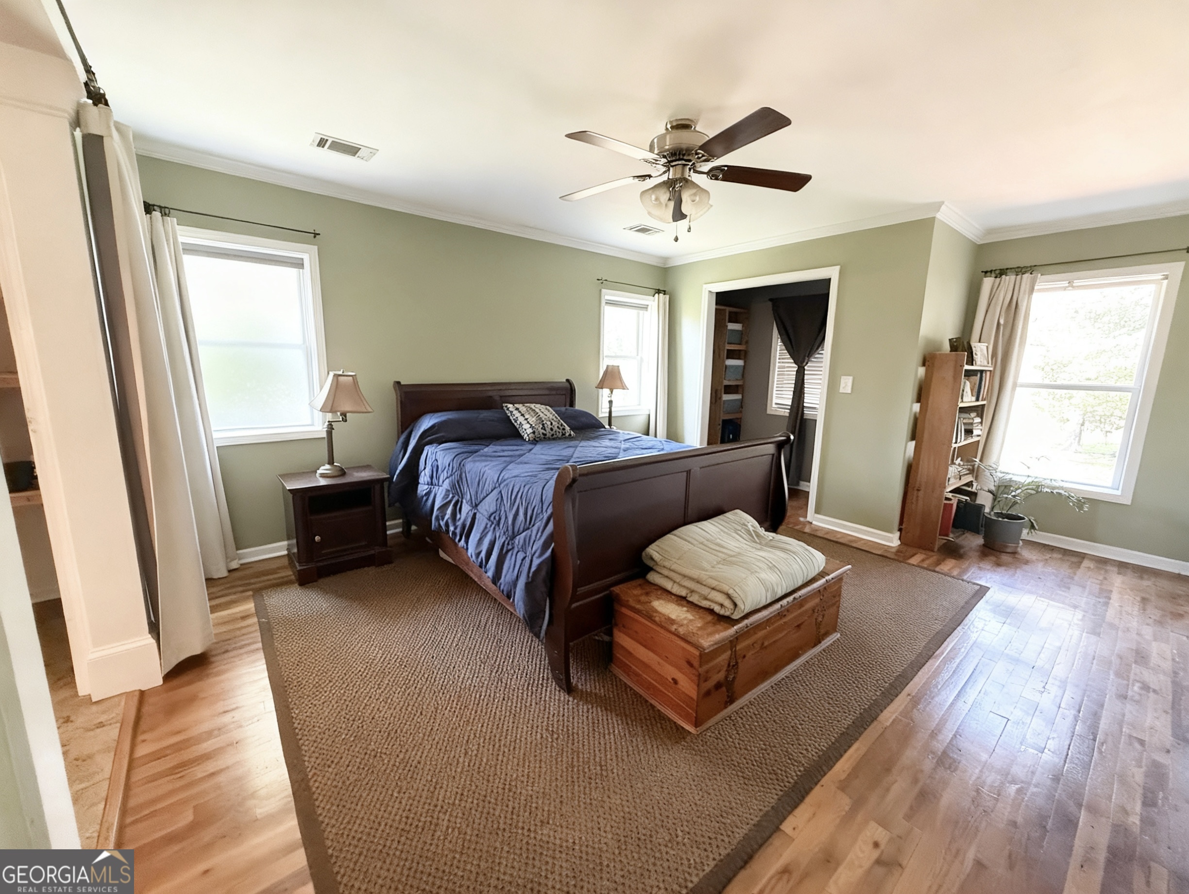 1191 Aderhold Rogers Road Commerce, GA 30530 - Photo 6 of 30 a bedroom with furniture and wooden floor