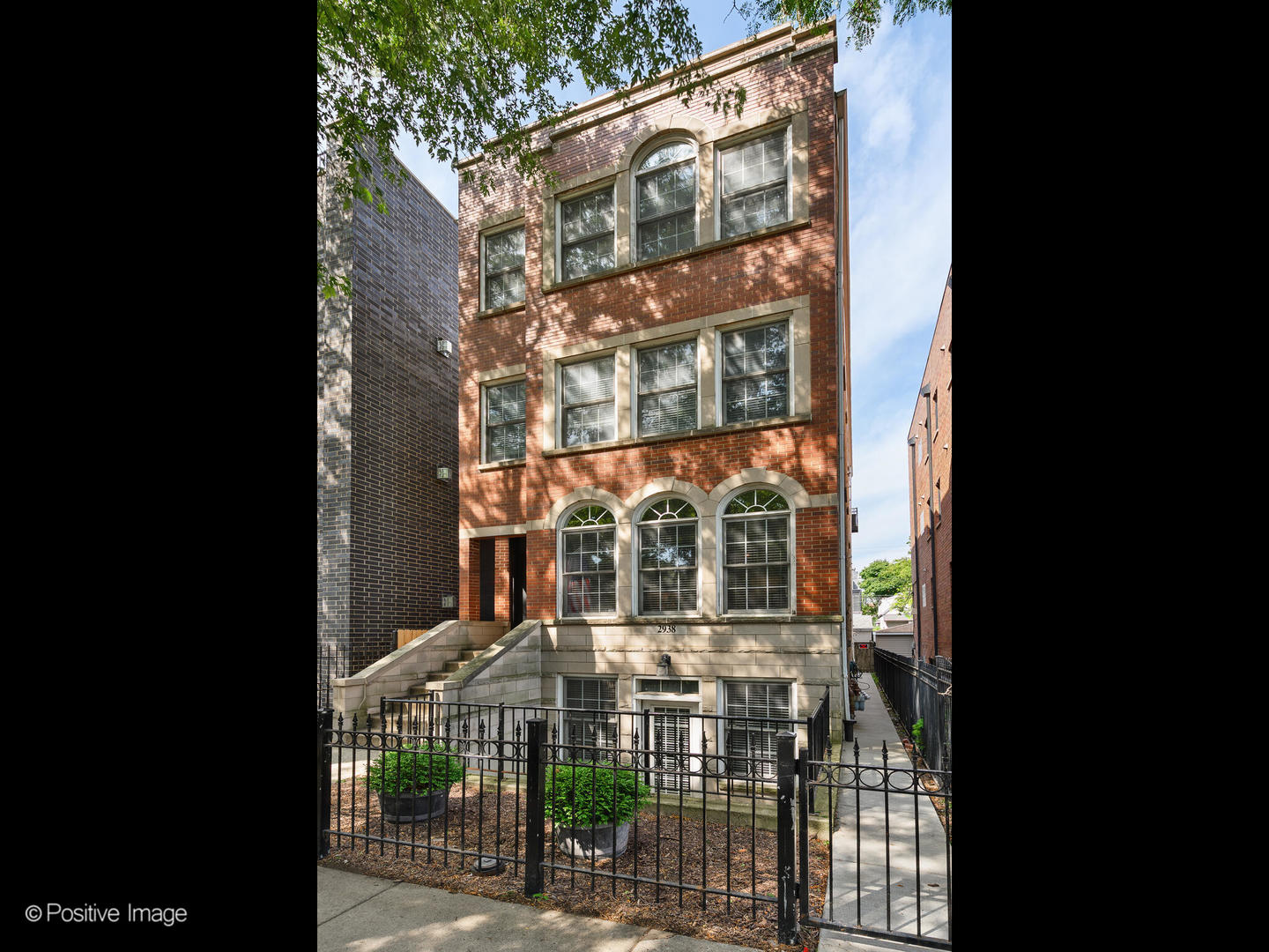 a view of a building with a street