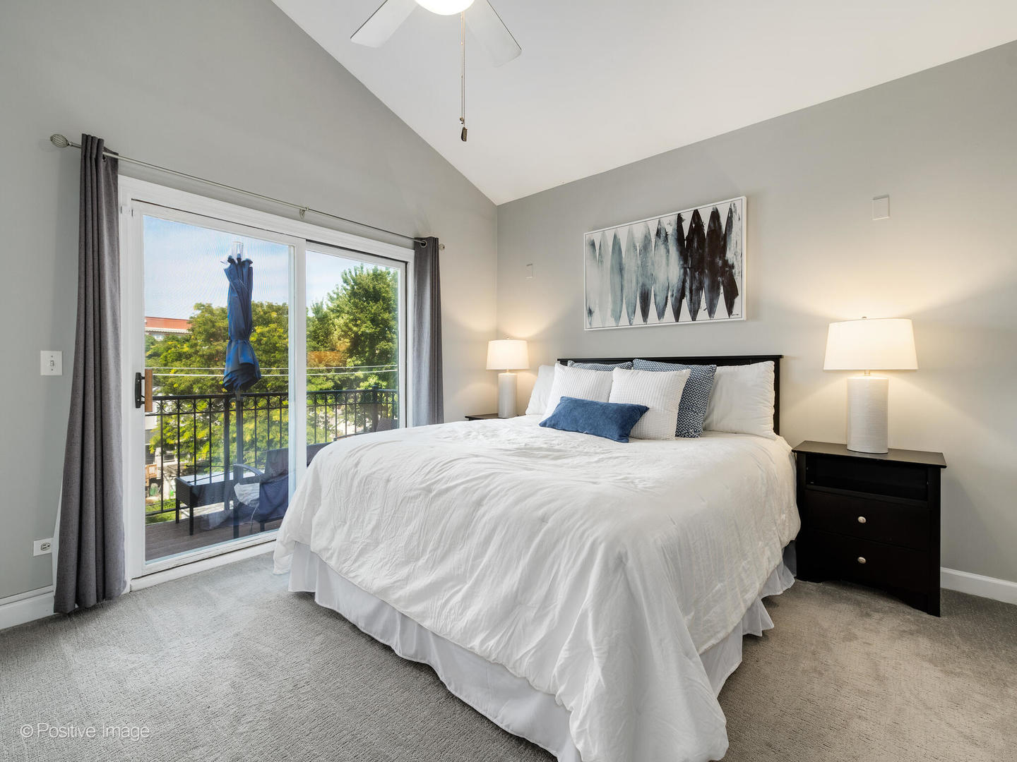 2938 North Damen Avenue, Unit 3 Chicago, IL 60618 - Photo 13 of 22 a bedroom with a bed and a night stand