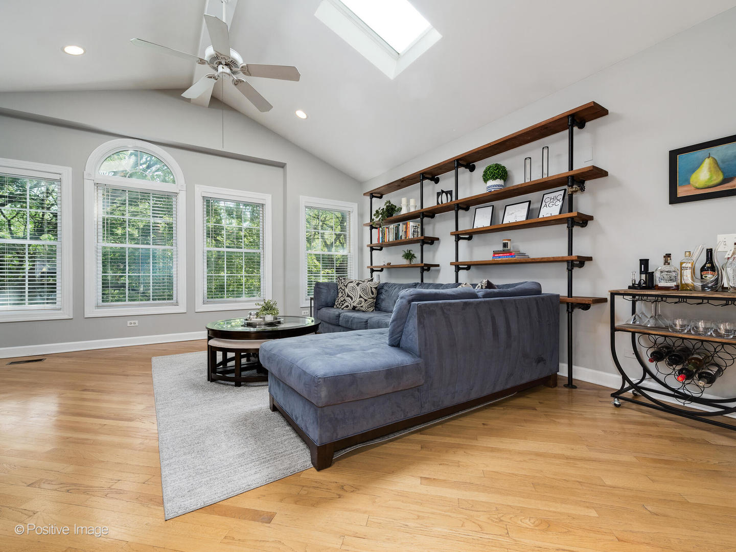2938 North Damen Avenue, Unit 3 Chicago, IL 60618 - Photo 4 of 22 a living room with furniture and a book shelf
