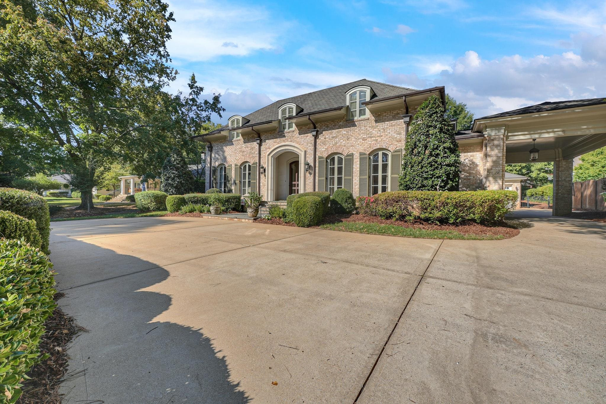 2229 Coley Forest Place Raleigh, NC 27607 - Photo 11 of 45 Front side angle with Porte Cochere side entrance Front View